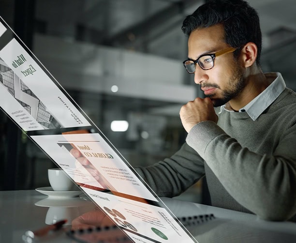 Man Analyzing Digital Report Tablet